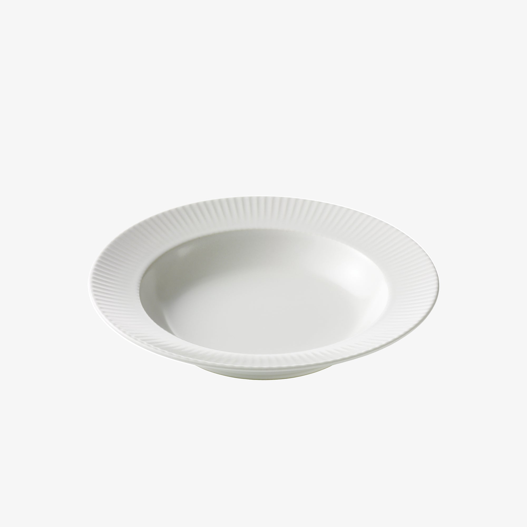 Groovy porcelain soup plate | White